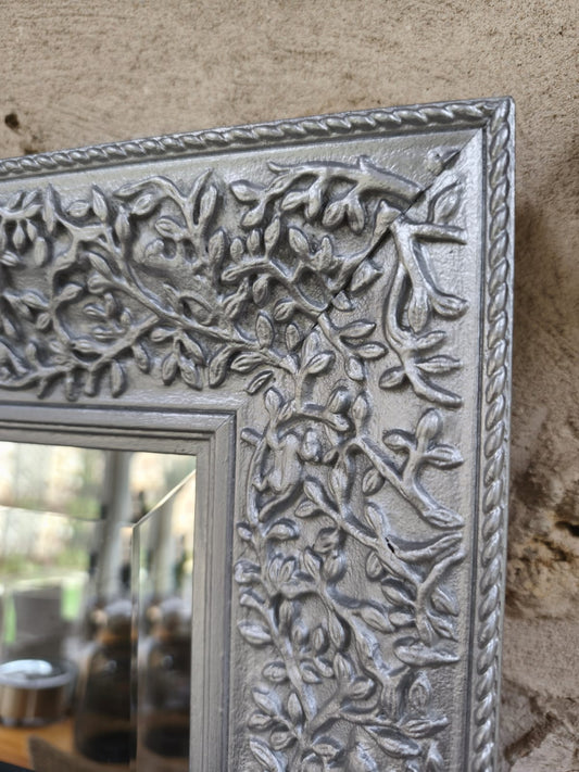 Miroir biseauté avec cadre argenté