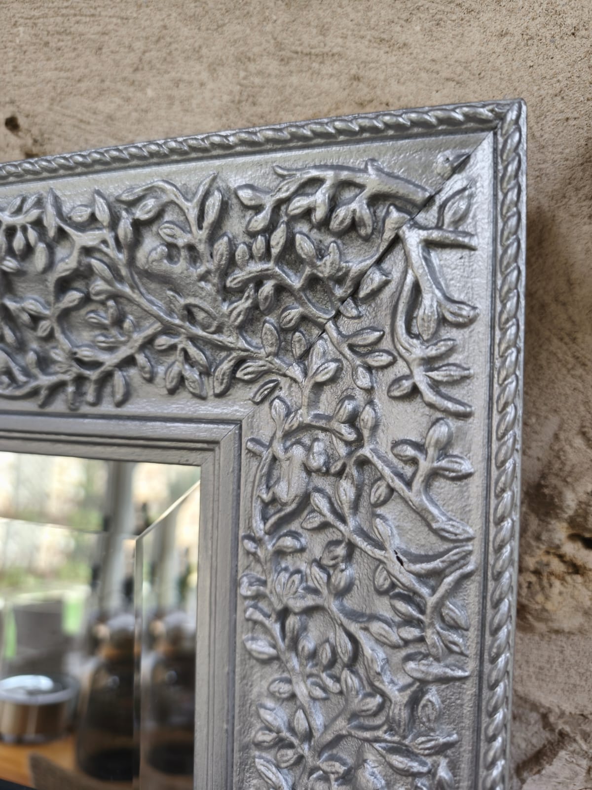 Miroir biseauté avec cadre argenté