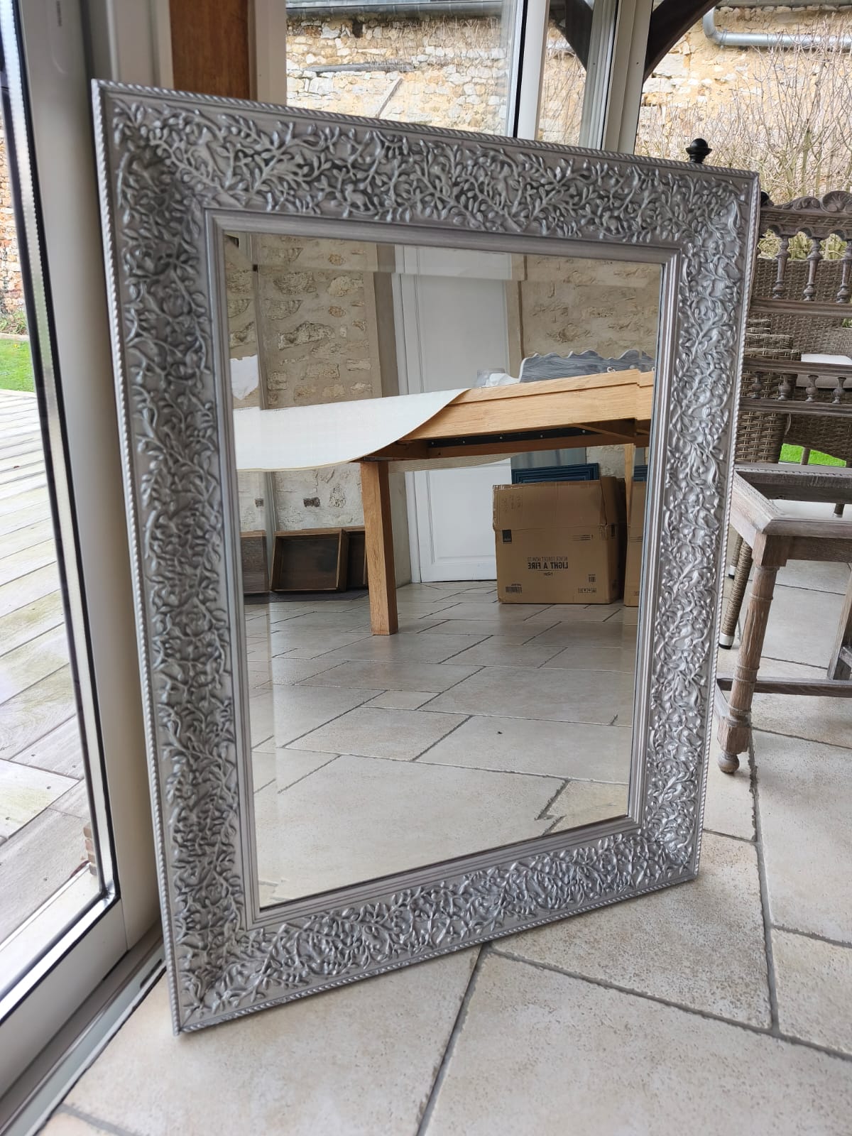 Miroir biseauté avec cadre argenté