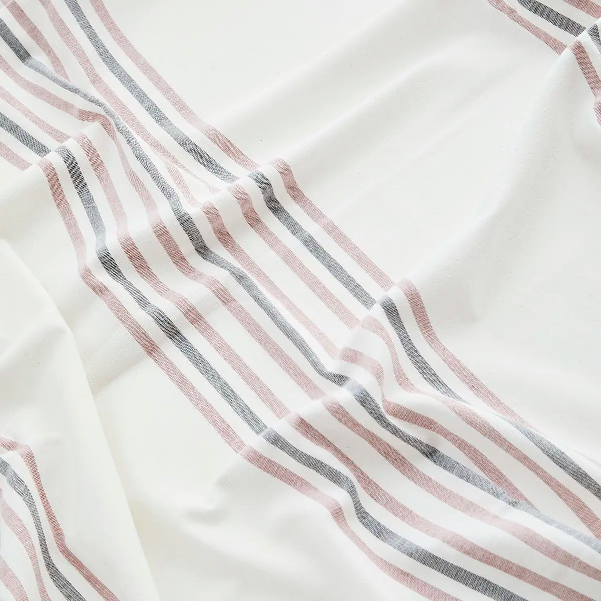 Plaid de plage rayé beige et rose